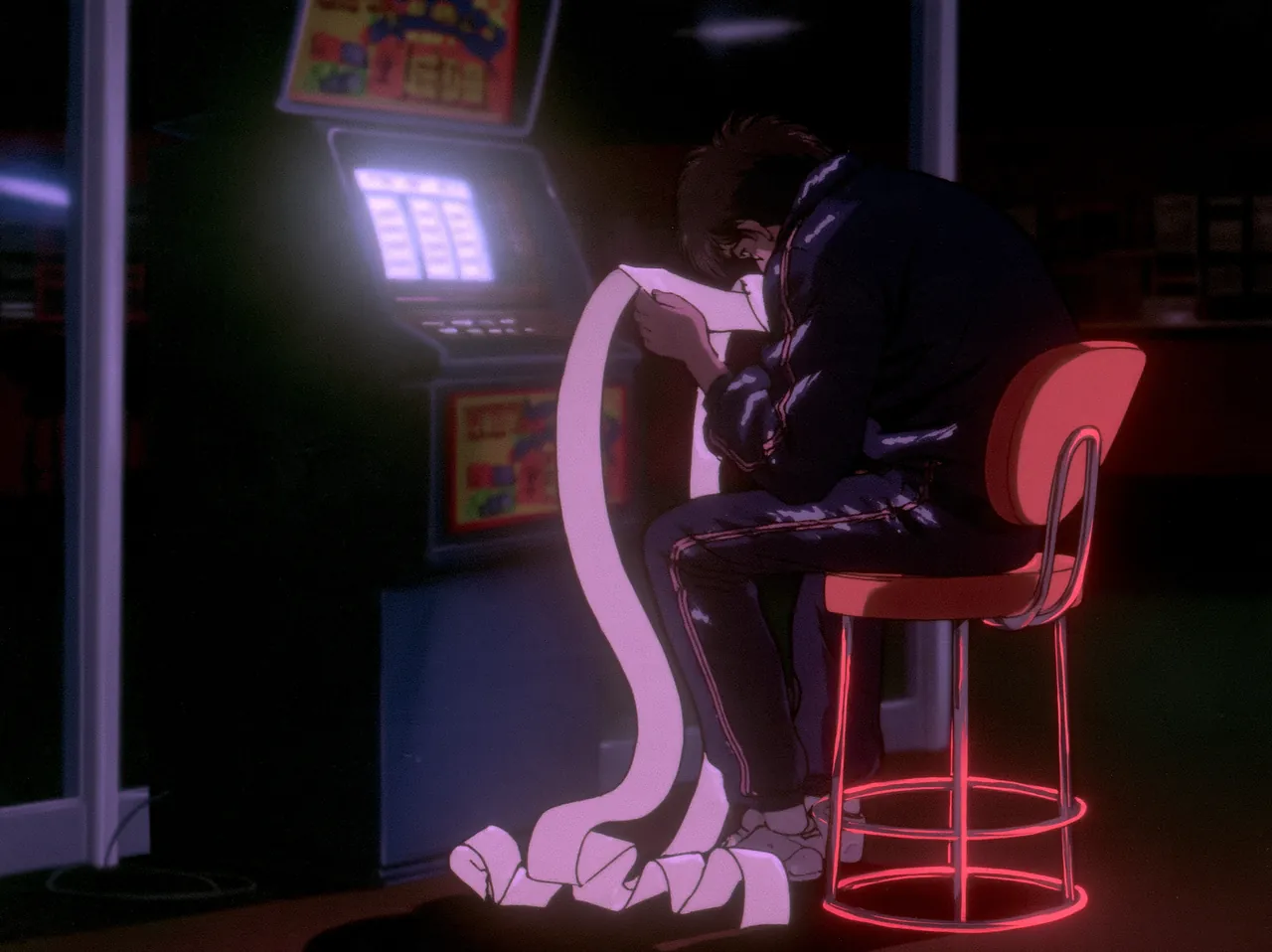 A young man in a tracksuit slumped on a stool beside a slot machine at dawn, reading a long strip of paper that pools at his feet